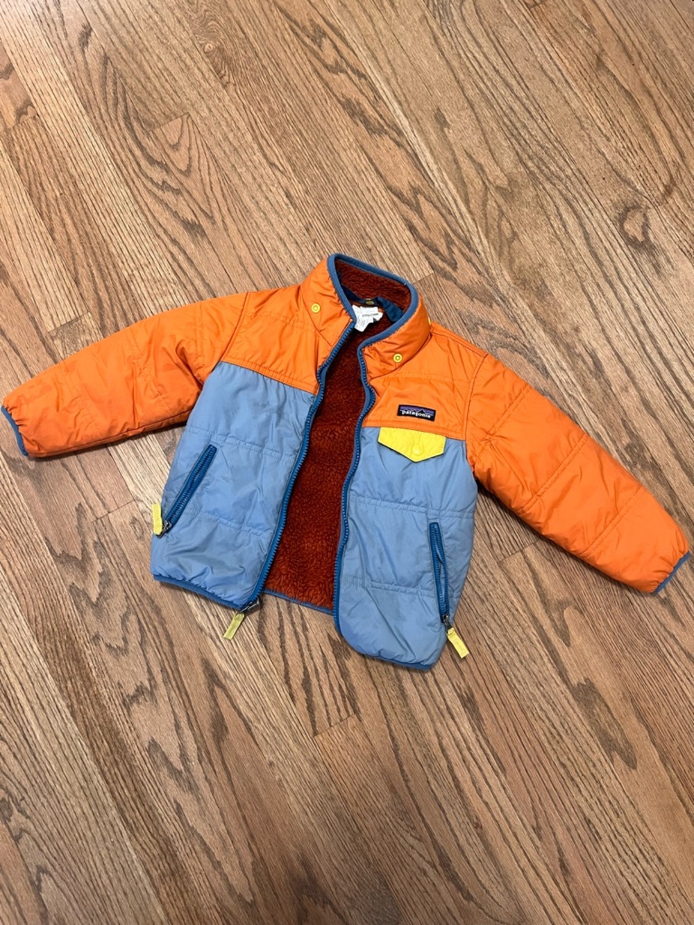 Patagonia Orange & Light Blue Kids Puffer Jacket with Yellow Accents